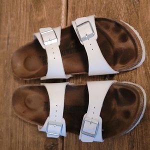 White Birkenstock sandals